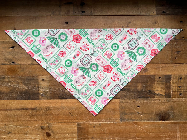 Decorative bandana with floral and geometric pattern on a wooden surface